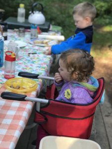 kids eating camping meal