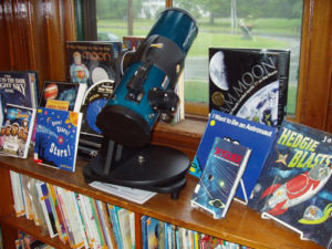 telescope and books - astronomy and kids