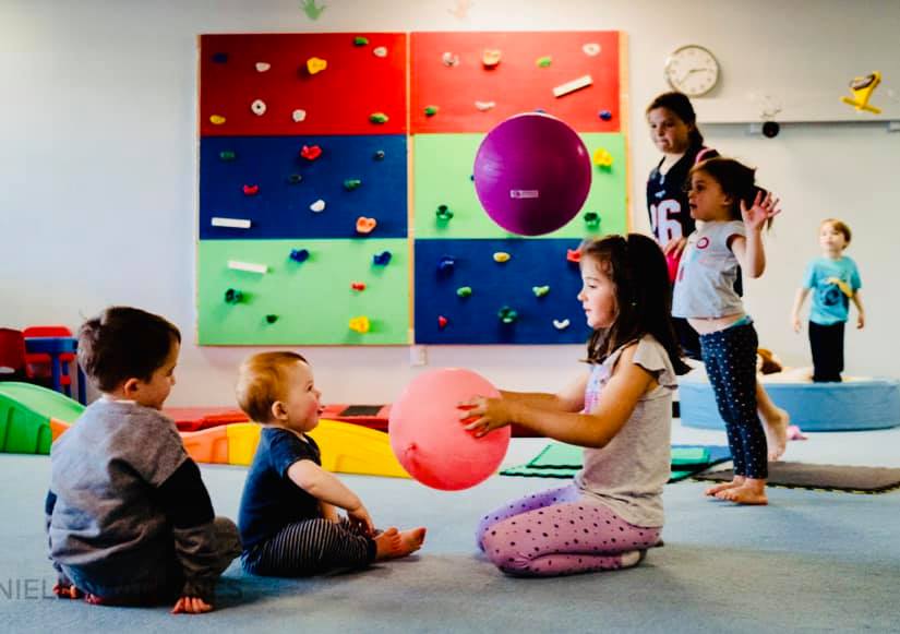 Beam Fitness and Tutoring Seacoast Indoor Place Place Kids playing with ball