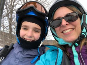 learn to ski on the seacoast - daughter and mother on ski lift