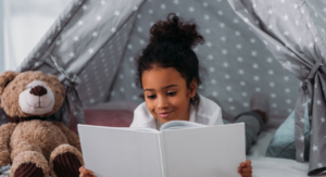 girl reading - fun reading and writing activities for kids