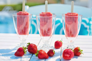 Canva – Sweet Strawberry Popsicles in Glasses