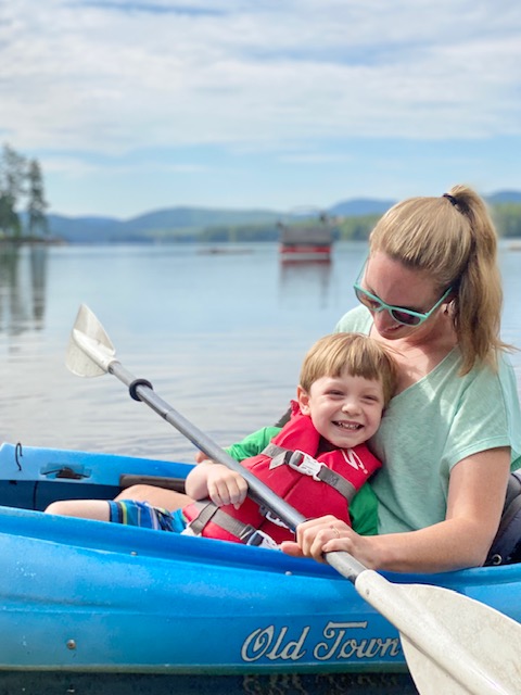 mom and son in kayak