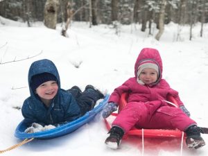 kids on sleds