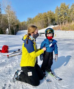Child and Mom masked at ski slope