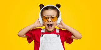 child listening to a podcast