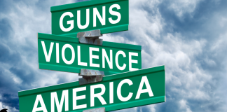 street signs with Guns, Violence and America on them