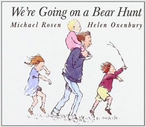 We're Going on a Bear Hunt book cover with a dad and three kids walking