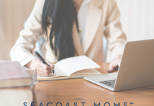 writer at a computer with Seacoast Moms