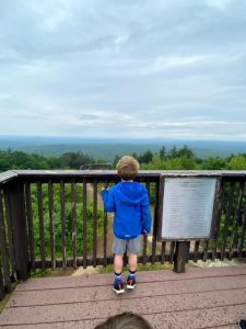 Little boy looks out on Mt. A view